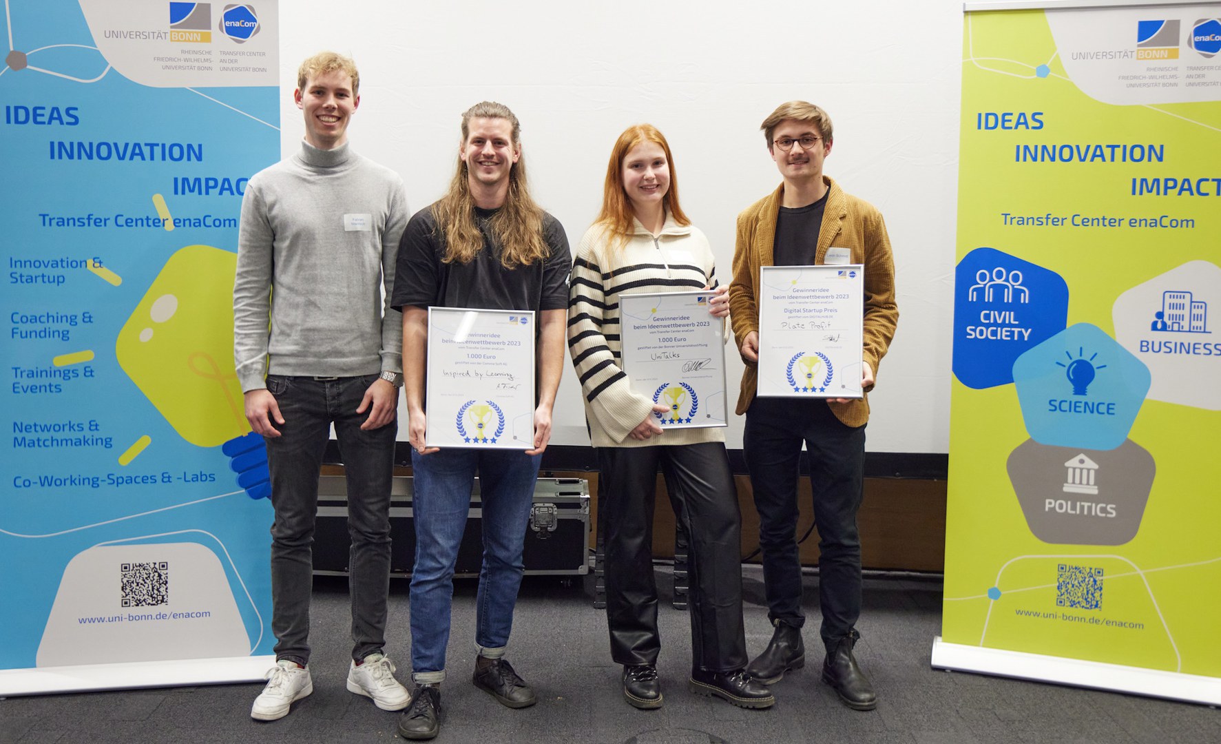 The winners of the ideas competition - Fabian Mantsch and Lars Pfleider ("Inspired by Learning"), Daria Kononenko ("UniTalks") and Leon Schmidt ("PlateProfit") (from left to right)